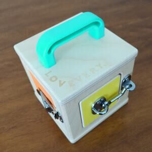 lovevery lock box baby wood toy from The Realist Play Kit 1y+